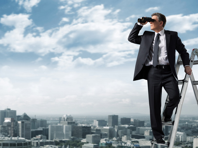 Business-man-with-binoculars-AdobeStock_57705428